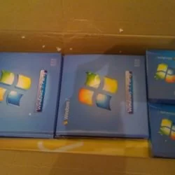 Some DVDs and poker cards all about windows 7 in the pack, and more, a big banner.